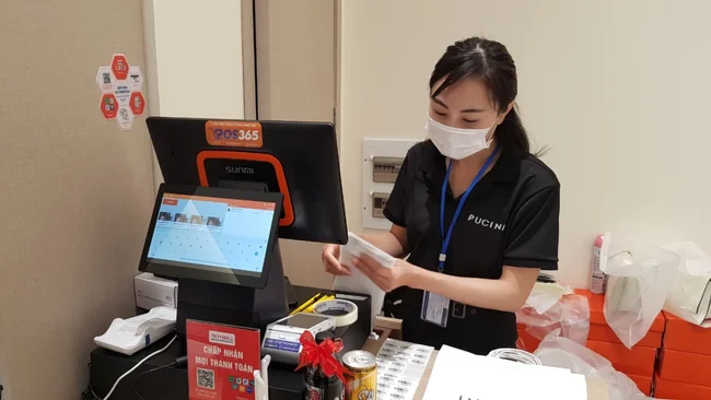 siêu thị dùng máy pos gì